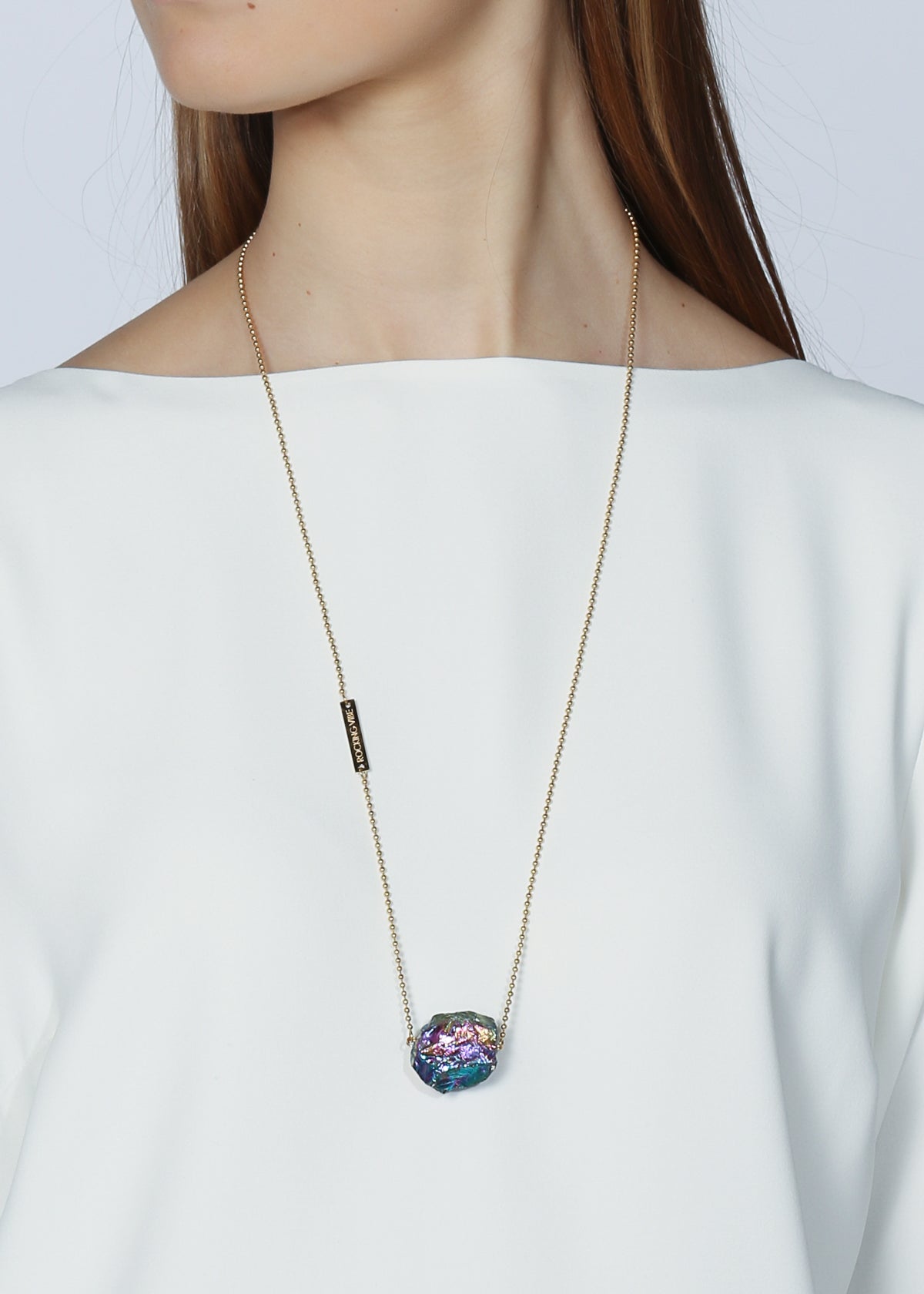 Titanium quartz rock on gold chain