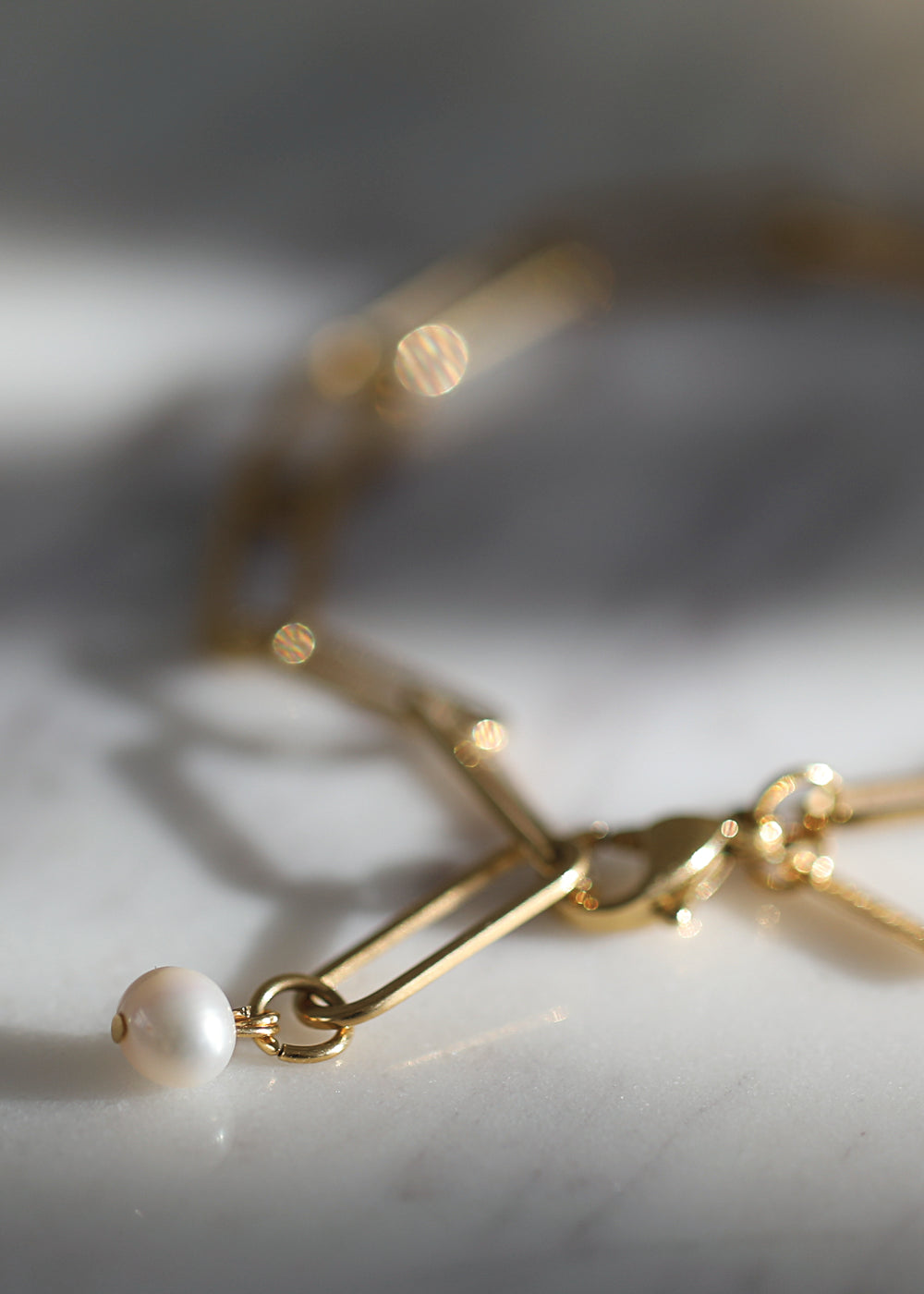Fluid gold paperclip bracelet