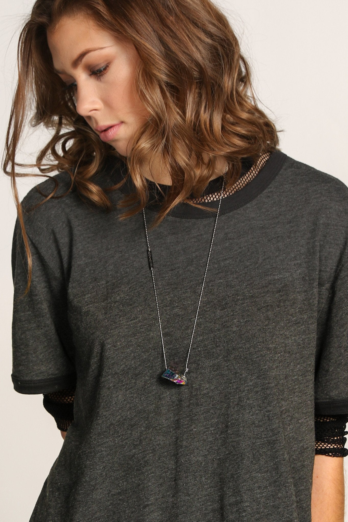 Alpha titanium quartz necklace in gunmetal, lifestyle shot - Rocking Vibe