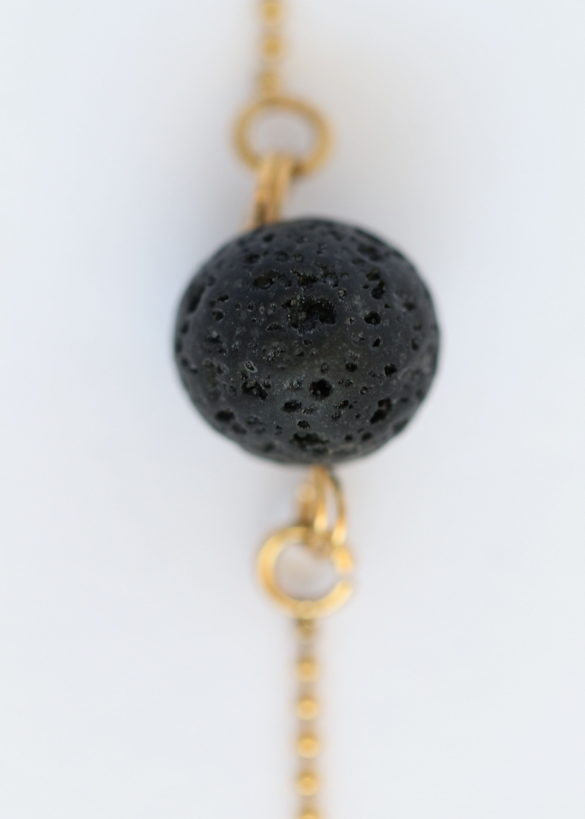 Equilibrium diffuser necklace in gold, alternate view - Rocking Vibe