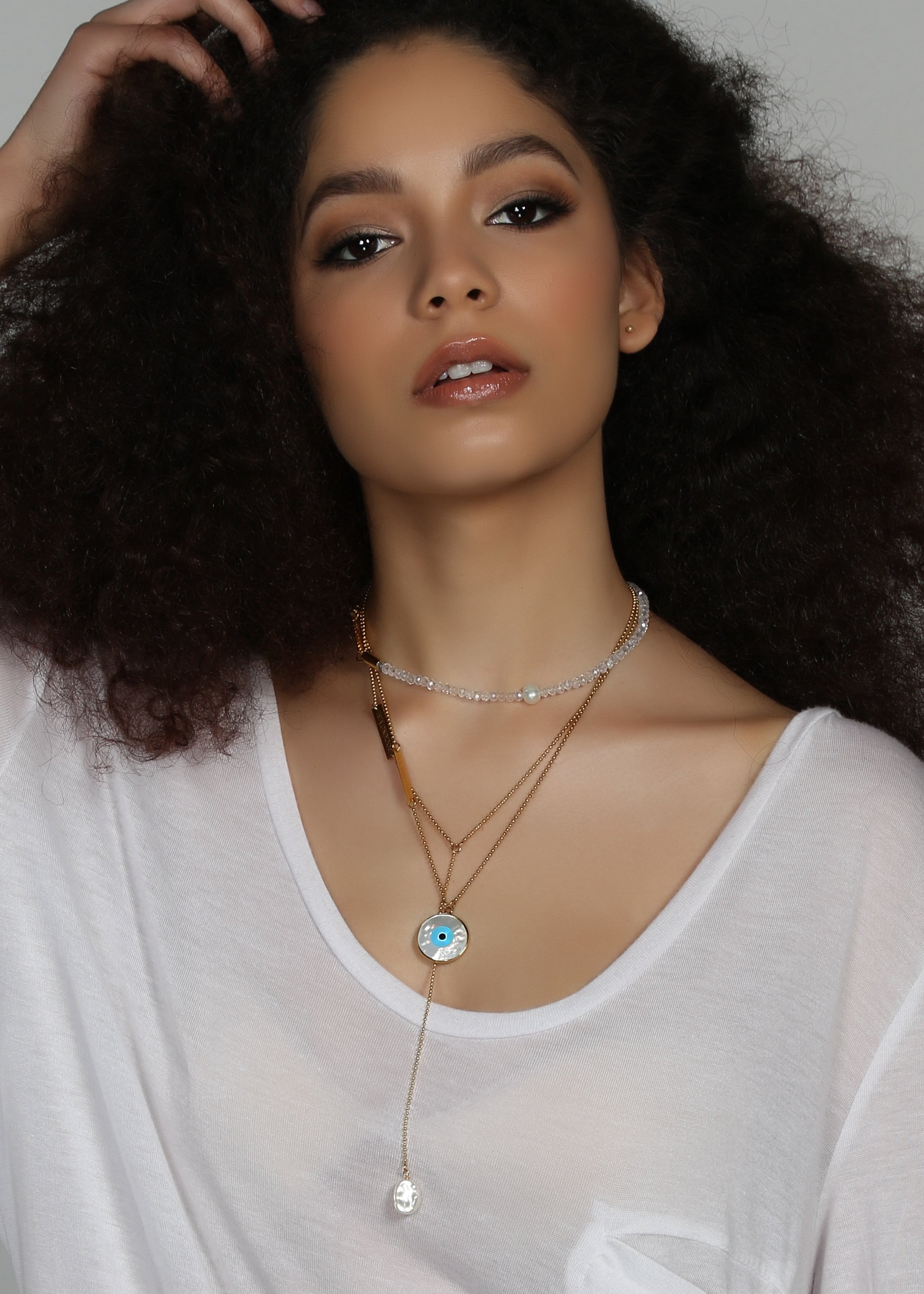 Journey diffuser necklace in gold, lifestyle shot - Rocking Vibe
